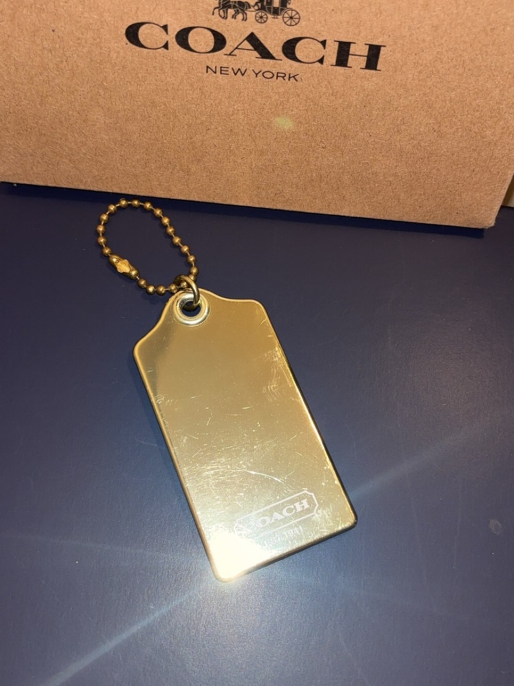 Coach large poppy metallic gold-tone hang tag EUC - Picture 6 of 7